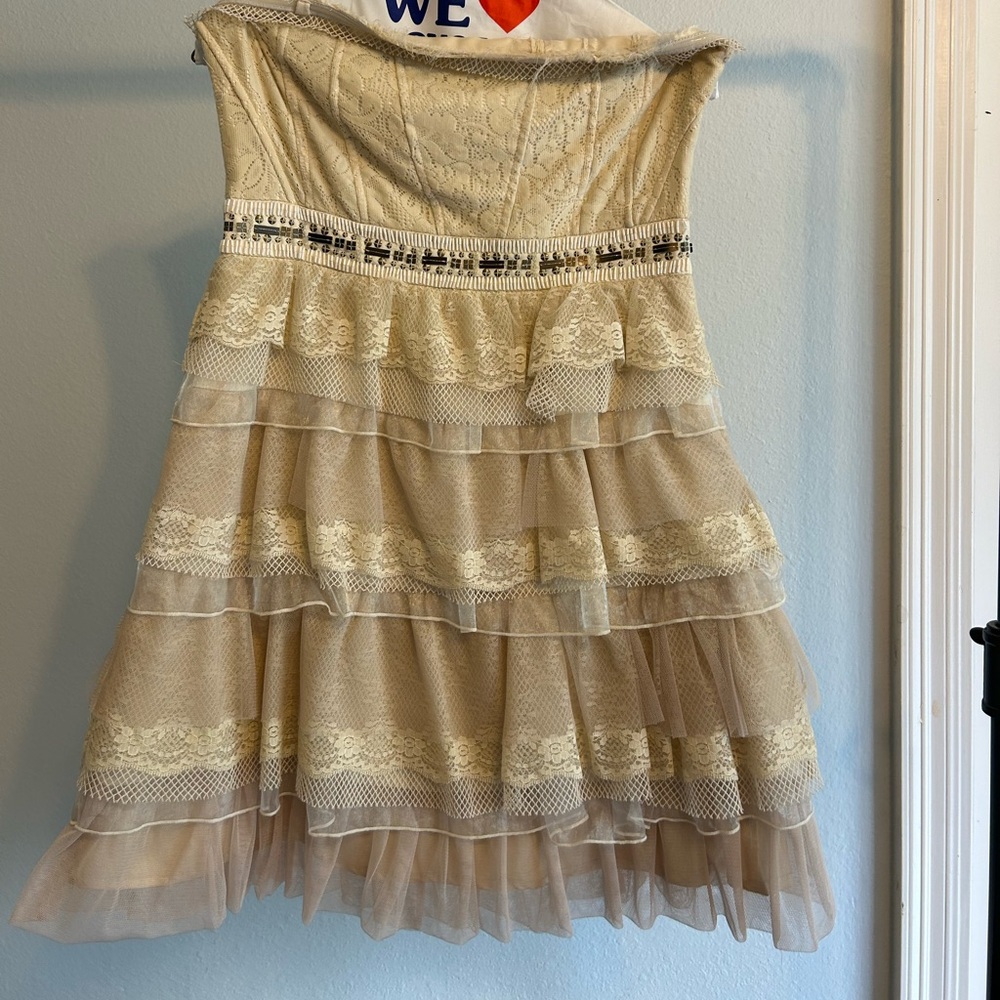 Tan ruffle mini dress